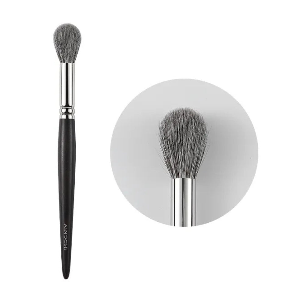 Fluffy round makeup brush for smooth finish 1